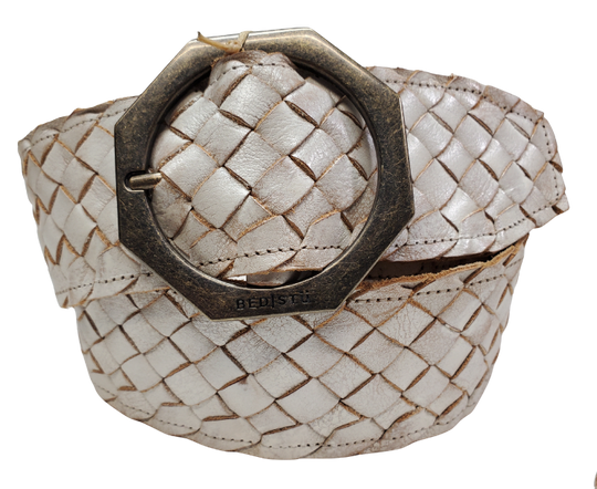 White - The Dreamweaver Wide braid distressed leather belt adorned with a octagon shaped metal buckle, the effortlessly infuses a touch of Vintage and Boho into your style. Whether worn on the waist or the hip, this belt stands as a remarkable addition to any wardrobe. Now stocked at our Smyrna, TN shop not far from 12th Ave. in Nashville.