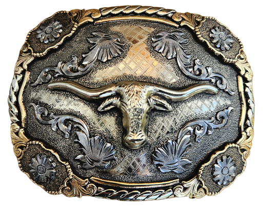 The Bessie Moo Belt Buckle has the ever classic Longhorn design accented with a multi Western scrolls, a hint of Rope on the edge with 4 Flower rosettes. A Classic Western belt buckle at it&