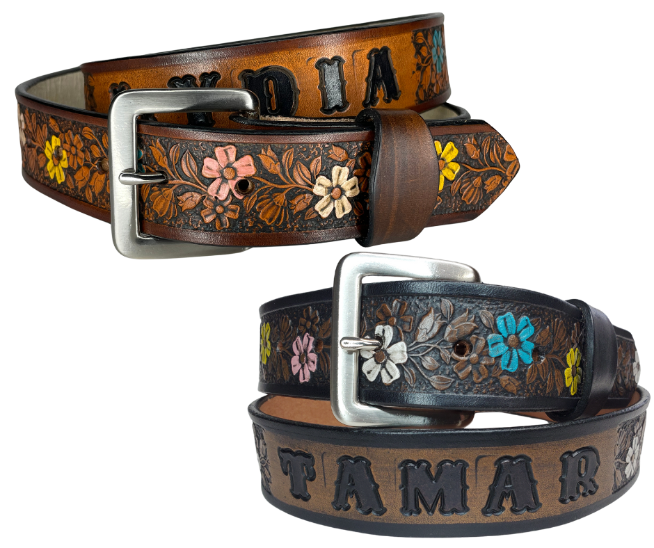 "The Beulah Land" is a handmade real VEGTAN belt made from a single strip of cowhide shoulder leather that is 8-10 oz. or approx. 1/8" thick. It has hand burnished (smoothed) edges and summer flowers embossed on the surface and with most HAND PAINTED in Pink, White, Yellow and Turquoise. The antique nickel plated solid brass buckle is snapped in place with heavy snaps.  This belt is made just outside Nashville in Smyrna, TN.