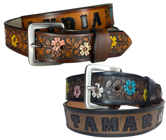 "The Beulah Land" is a handmade real VEG-TAN belt made from a single strip of cowhide shoulder leather that is 8-10 oz. or approx. 1/8" thick. It has hand burnished (smoothed) edges and summer flowers embossed on the surface and with most HAND PAINTED in Pink, White, Yellow and Turquoise. The antique nickel plated solid brass buckle is snapped in place with heavy snaps.  This belt is made just outside Nashville in Smyrna, TN.