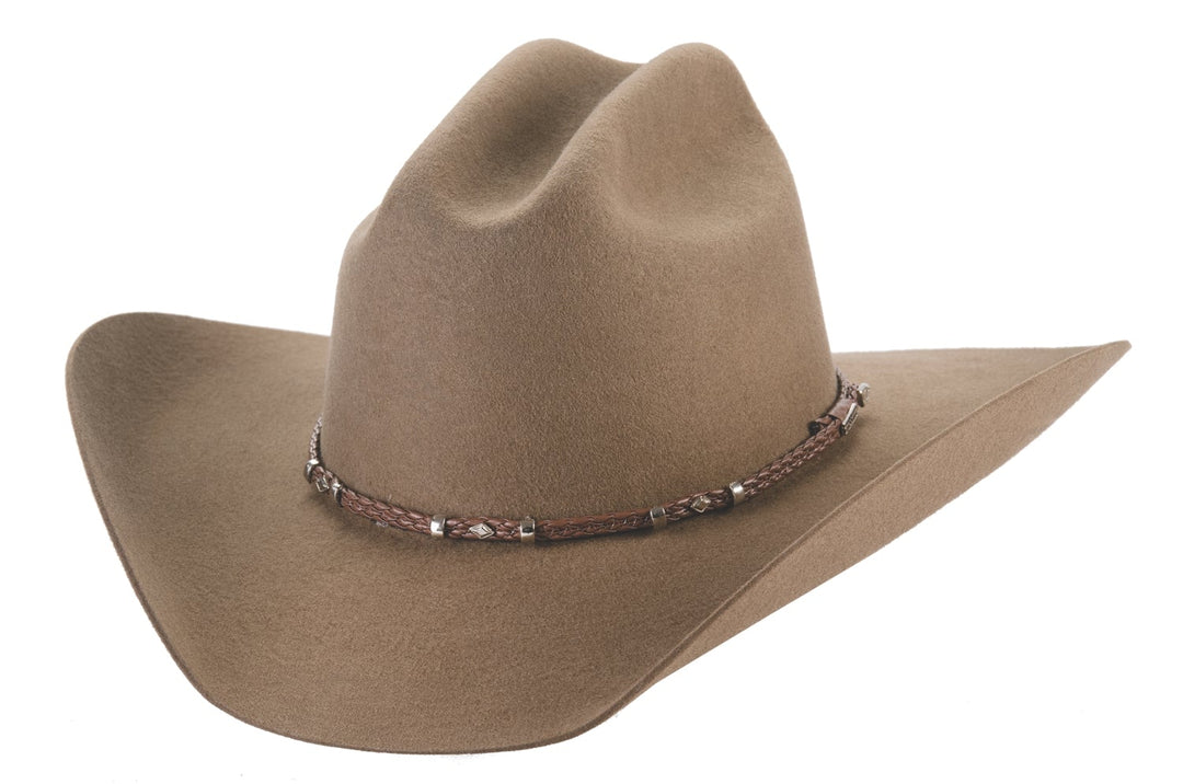 The Unisex Gholson 4x hat. Classic Western Cattleman crown and Brim shape. Braided style leather band with metal accents. May be steamed and shaped for your personal style Now in stock at our Smyrna, TN shop not from Tennessee Miller Coliseum in Murfreesboro.