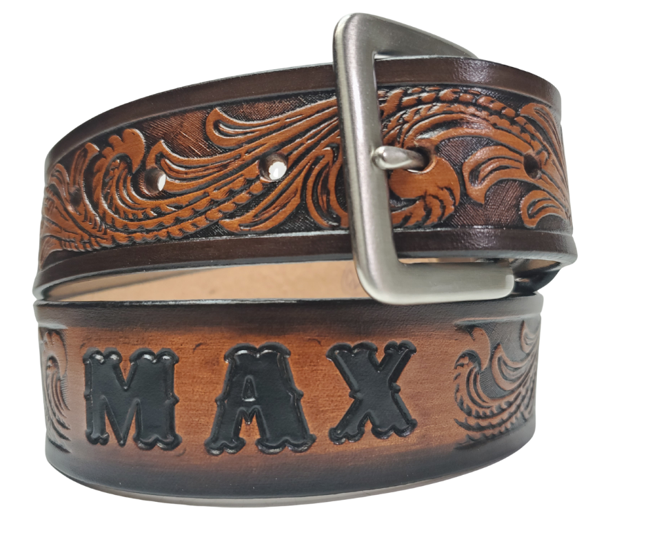 Our Patriot" Name Leather Belt is Full grain American vegetable tanned cowhide approx. 1/8"thick.&nbsp;Width 1 1/2" and includes Antique Nickle plated Solid Brass buckle. Hand Finished with Smooth burnished painted edges. Choose with or without name, if without name, design will cover entire length of belt. For name Type name desired on belt in "Type Name Here" section, no more than 10 letters maximum. Buckle snaps in place for easy changing if desired. Made in our Smyrna, TN, USA shop.