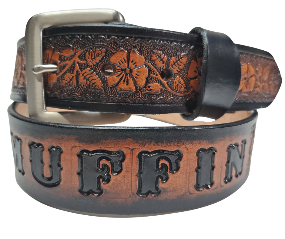 "The Wallflower" is a handmade real leather belt made from a single strip of cowhide shoulder leather that is 8-10 oz. or approx. 1/8" thick. It has hand burnished (smoothed) edges and summer flowers embossed in 3 color options. The antique nickel plated solid brass buckle is snapped in place with heavy snaps. This belt is made just outside Nashville in Smyrna, TN.