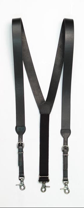 Leather suspenders are the perfectly stylish accessory for your wardrobe. The main leather straps are 1 3/8" and taper to 3/4". Buckle adjustment and elastic back and scissor style clips for easy attachment to pants. Stocked in our Smyrna, TN store 20 miles from Nashville.

Measured adjustment 36" - 44"
Adjustable
Suspenders are measured from back center belt loop, over the shoulder to front belt loop
Imported