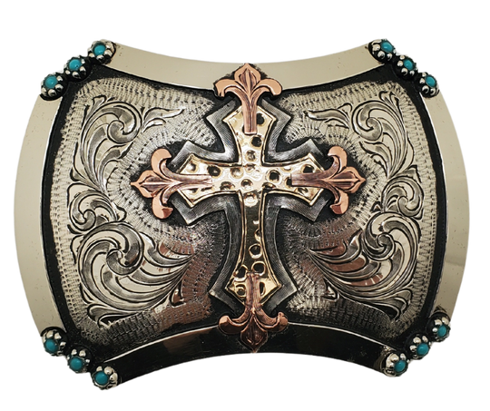 The Blessed Assurance buckle has a scalloped square shape with a Western scrolling, and a beaded edge. Made from 100% German silver (nickel and brass alloy) brass and copper accents. Each piece is punched, engraved, polished in order to give you the quality and long lasting final product we also plate each piece through electromagnetic processes. Buckle size is approx. 3"x 4" Available in our Smyrna, TN shop a short drive from Nashville.