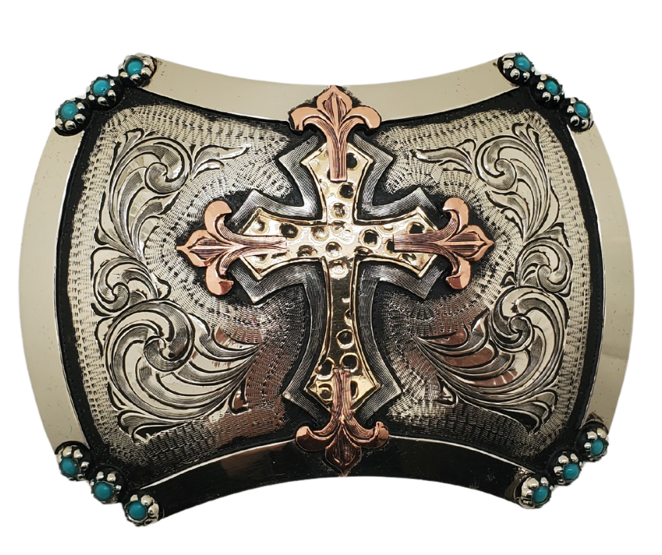 The Blessed Assurance buckle has a scalloped square shape with a Western scrolling, and a beaded edge. Made from 100% German silver (nickel and brass alloy) brass and copper accents. Each piece is punched, engraved, polished in order to give you the quality and long lasting final product we also plate each piece through electromagnetic processes. Buckle size is approx. 3"x 4" Available in our Smyrna, TN shop a short drive from Nashville.