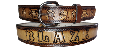  This leather belt showcases artwork of boots, horseshoes, and a hat, and is a fashionable addition to any wardrobe. The metal buckle is removeable, making it easy to customize your buckle. Stocked in our Tennessee location, you can get it quickly with our Quick Ship option.
