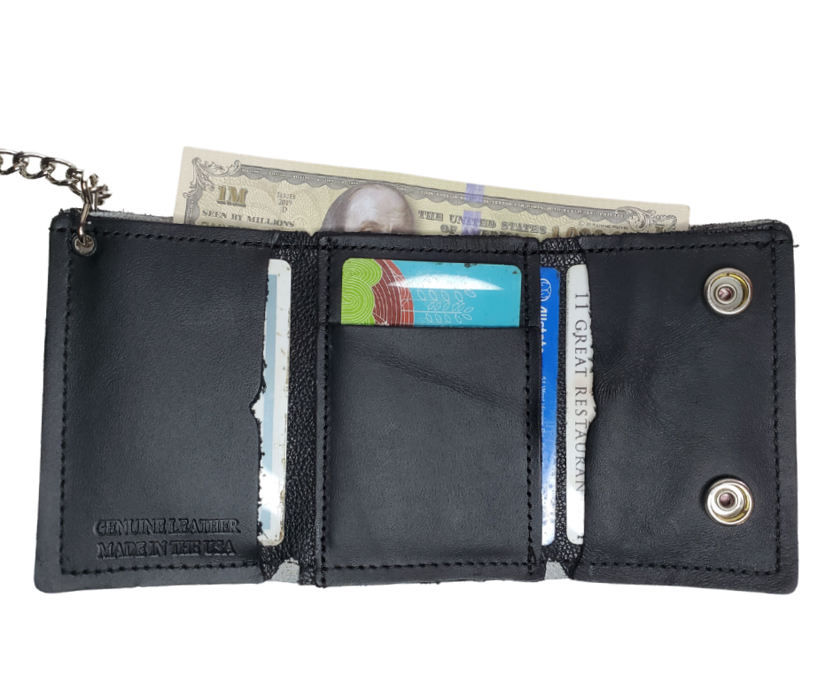 Take a chance and Roll the Dice with our all leather Tri-fold Chain Wallet. 1 Cash Slot for all your important stash, 3 card slots and 1 underneath the middle slot. It's USA made & and Buckle and Hide approved. Approx. 3"x 4" folded. 2 snap closure. Complete with an 12" chrome plated chain including leather belt loop. Available in our Smyrna, TN shop a short drive from downtown Nashville. Like most wallets over stuffing will limit the time of use. Colors may vary from picture.