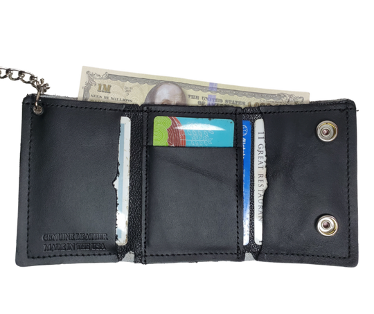 Take a chance and Roll the Dice with our all leather Tri-fold Chain Wallet. 1 Cash Slot for all your important stash, 3 card slots and 1 underneath the middle slot. It's USA made & and Buckle and Hide approved. Approx. 3"x 4" folded. 2 snap closure. Complete with an 12" chrome plated chain including leather belt loop. Available in our Smyrna, TN shop a short drive from downtown Nashville. Like most wallets over stuffing will limit the time of use. Colors may vary from picture.