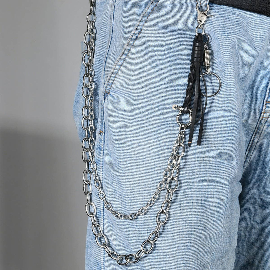 Be a trendsetter with the Braided Leather Tassel Jean Chain. The 2 Belt loop clips easily attach to you favorite old jeans to give you edgy look you crave. Let your inner Rocker out when you go see your favorite metal band at your favorite watering hole or at the arena. Now in stock at our Smyrna, TN shop not far from the First Bank Amphitheater.

Metal alloy
Imported
