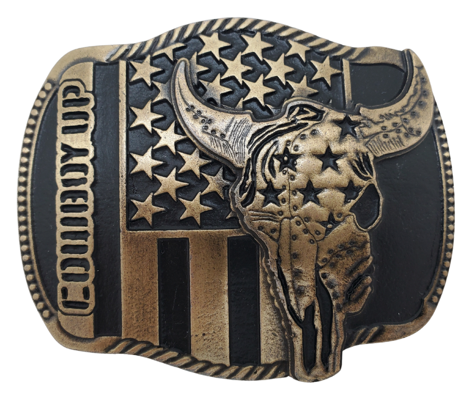 The "Braxton" Belt Buckle is a brass colored oval featuring a Buffalo Skull and a Patriotic USA flag, representing the well-known Rodeo term, "COWBOY UP." It is designed to fit a Standard 1.5 belt and measures approximately 4" x 3". Come visit our shop just outside Nashville in Smyrna, TN to get yours today!