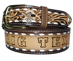 The Roadhouse name leather belt is a classic Vintage Throwback Style Western belt. Complete with White Buck Stitching and a embossed classic Western Floral design in a Brown and Natural finish. The belt is a 1 3/4"" width tapering up to 1 1 /2" wide. Full grain vegetable tanned cowhide, Width 1 1/2" and includes Gold finished  buckle Smooth burnished painted edges. Made in Mexico.  Buckle snaps in place for easy changing if desired. In stock at our Smyrna, TN shop.