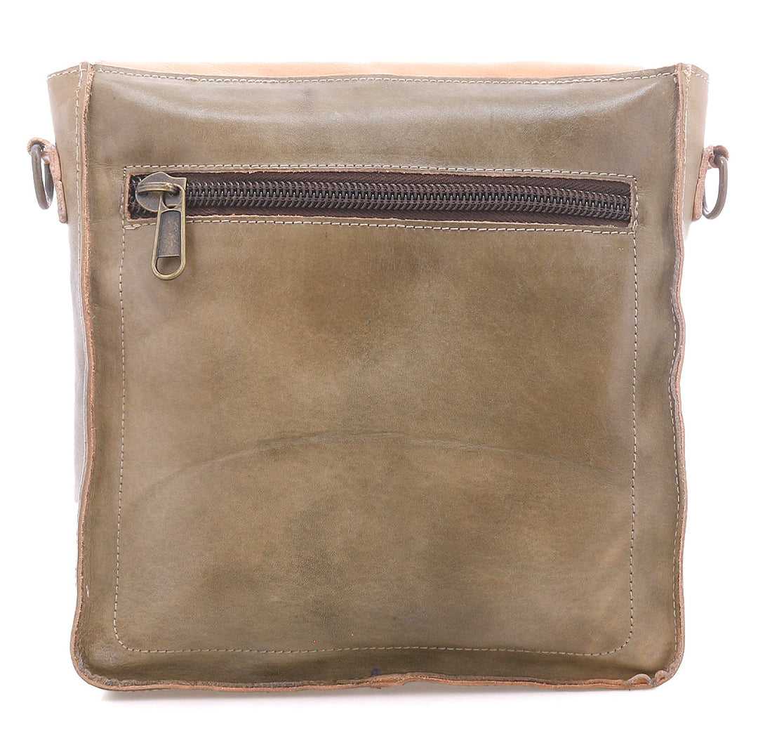The Venice Beach is cut from full-grain, vegetable-tanned leather, its structured flap and buckle detail lend a sense of intention to an otherwise relaxed silhouette. The adjustable strap allows for effortless crossbody wear, keeping movement natural and unencumbered. The inside interior keeps daily essentials in place. Equal parts practical and expressive, Venice Beach feels at home wherever the day leads. See this awesome bag at our Smyrna, TN shop not far from Franklin.