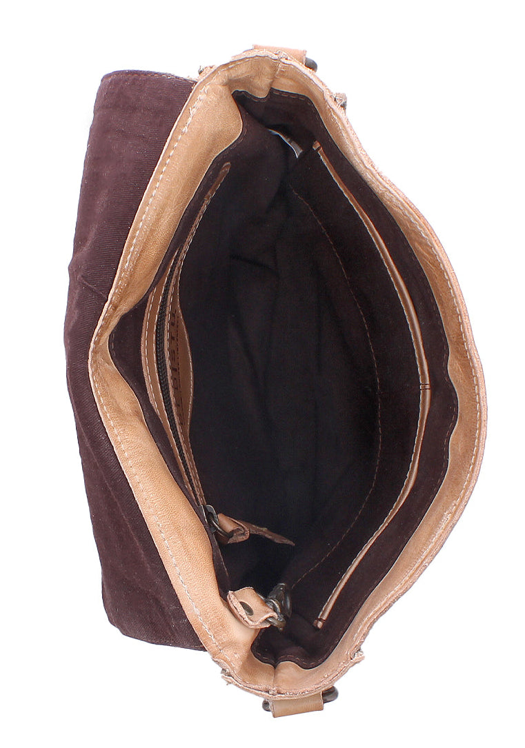 The Venice Beach is cut from full-grain, vegetable-tanned leather, its structured flap and buckle detail lend a sense of intention to an otherwise relaxed silhouette. The adjustable strap allows for effortless crossbody wear, keeping movement natural and unencumbered. The inside interior keeps daily essentials in place. Equal parts practical and expressive, Venice Beach feels at home wherever the day leads. See this awesome bag at our Smyrna, TN shop not far from Franklin.