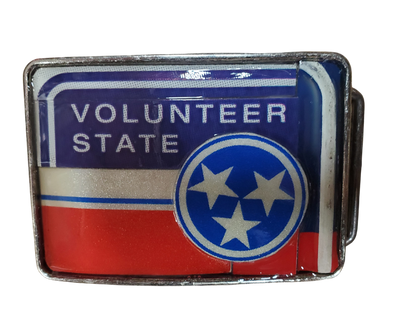 Hand Crafted Tennessee Volunteer look with our handmade license plate belt buckle. It's a great choice for cheering on your favorite Tennessee teams or for celebrating the great volunteer state! This eye-catching piece measures approx. 3" x 4" and can be matched with any 1 1/2" belt. Get yours today from our Smyrna, TN (near Nashville) store or online and show your style!