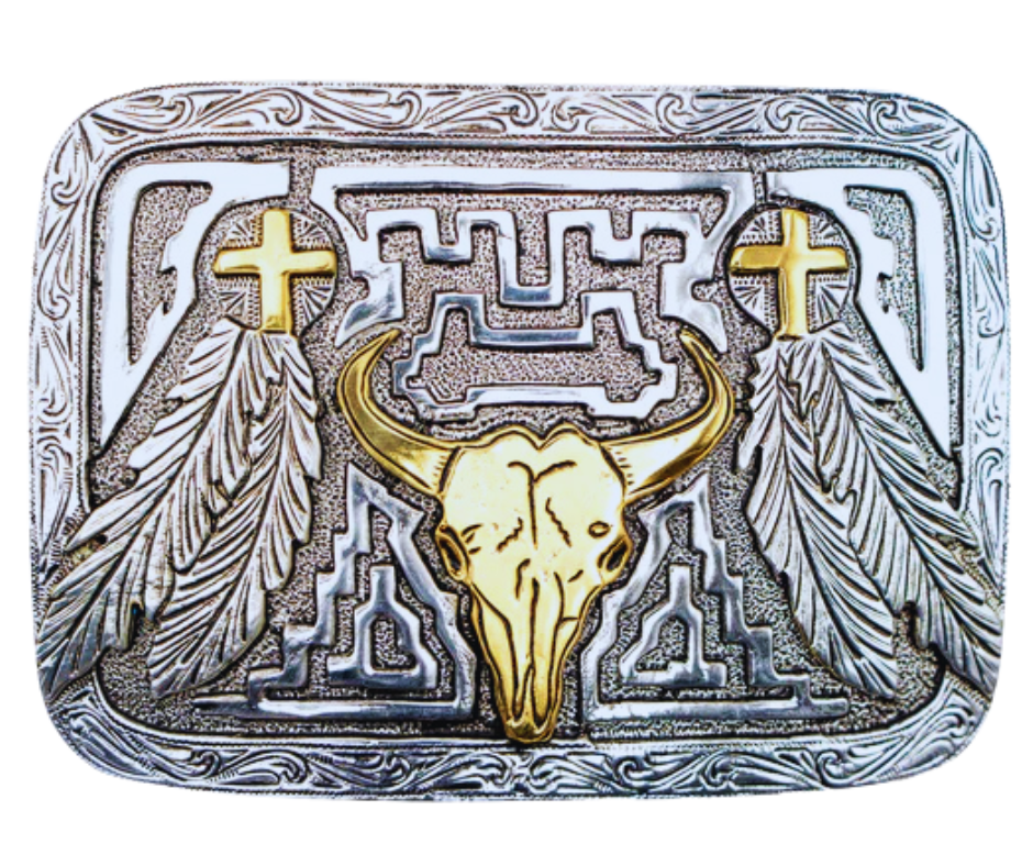 Step into the Wild West with The 'Buffalo Canyon' Belt Buckle! Its Buffalo Skull, Feathers, and Western Scroll border provide a classic look, while the contrasting gold and Antique Silver background make it a classic. The comfortable 2 1/2" H x 3 1/2" W size fits belts up to 1 3/4" wide, offering a great choice for any outfit. Available at our Smyrna, TN store, just a short trip from the bustling streets of downtown Nashville. Imported Zinc material from Mexico.