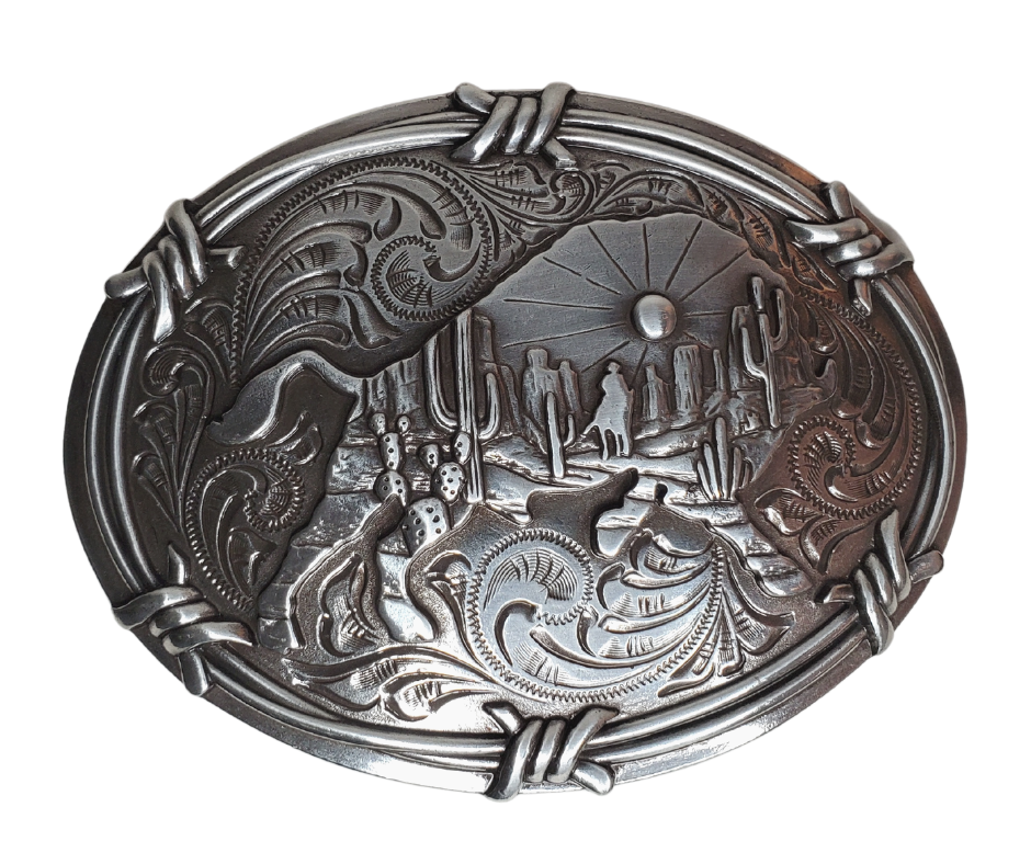 Embrace your inner wild side with this stunning southwestern-style belt buckle, featuring a scroll background, barbwire border, and a majestic bison cast in an antique silver hue. It's 3" X 4" and sized for any 1 1/2" belt available in our Smyrna, TN (near Nashville) store or online.