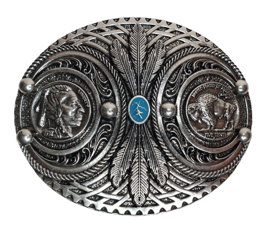 The oval shaped belt buckle has high quality replica Buffalo Indian Head nickels set on each end. Wrapping the Nickels is detailed Southwest trim with Feathers and a small Turquoise colored stone. Fits 1 1/2" belts and is approx. 3" tall x 4"across. Available at our shop just outside Nashville in Smyrna, TN. Made by Montana Silversmith.