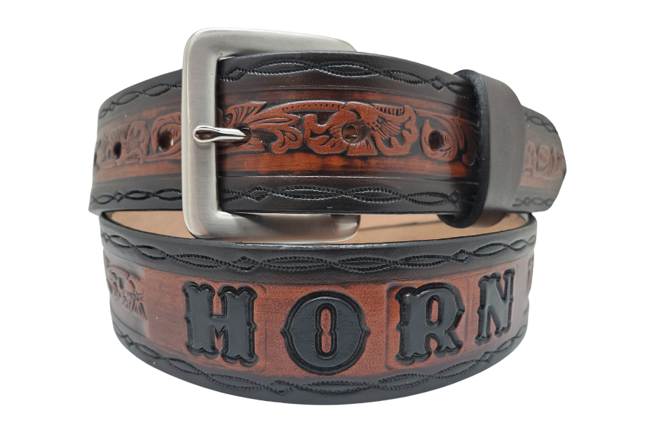 Close-up of Bandit Western floral belt with figure-eight border, two-tone brown color