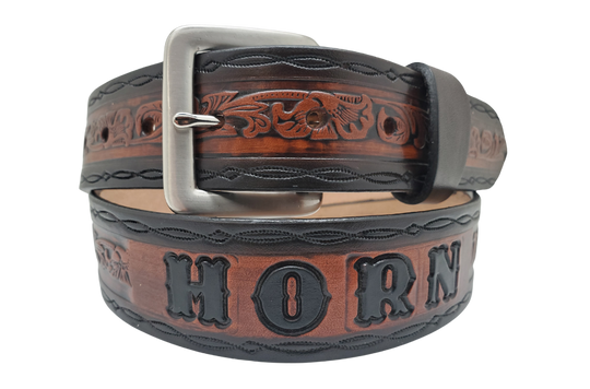 Close-up of Bandit Western floral belt with figure-eight border, two-tone brown color