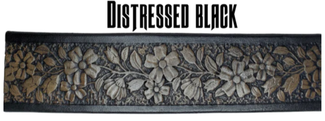 "The Beulah Land" is a handmade real leather belt made from a single strip of cowhide shoulder leather that is 8-10 oz. or approx. 1/8" thick. It has hand burnished (smoothed) edges and summer flowers embossed in 3 color options.  The antique nickel plated solid brass buckle is snapped in place with heavy snaps.  This belt is made just outside Nashville in Smyrna, TN.