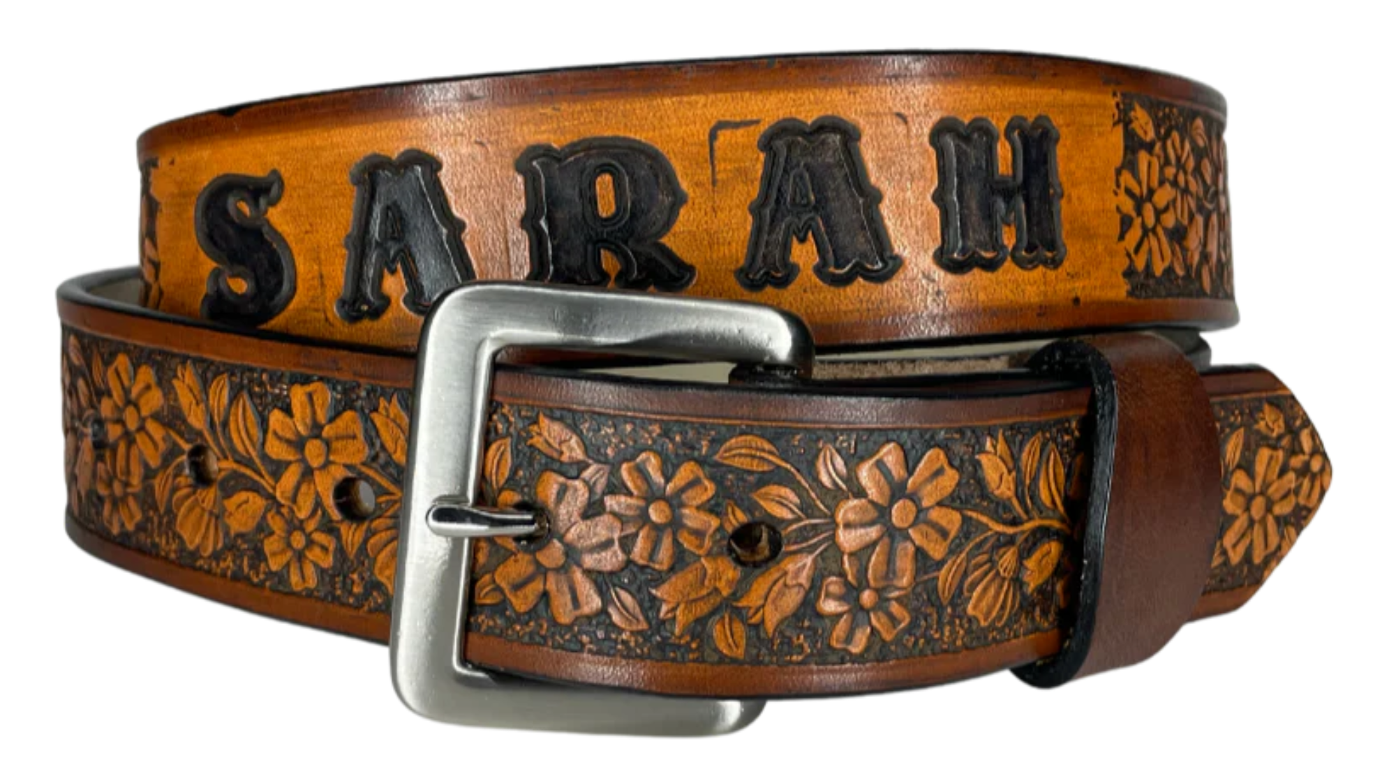 "The Beulah Land" is a handmade real leather belt made from a single strip of cowhide shoulder leather that is 8-10 oz. or approx. 1/8" thick. It has hand burnished (smoothed) edges and summer flowers embossed in 3 color options.  The antique nickel plated solid brass buckle is snapped in place with heavy snaps.  This belt is made just outside Nashville in Smyrna, TN.