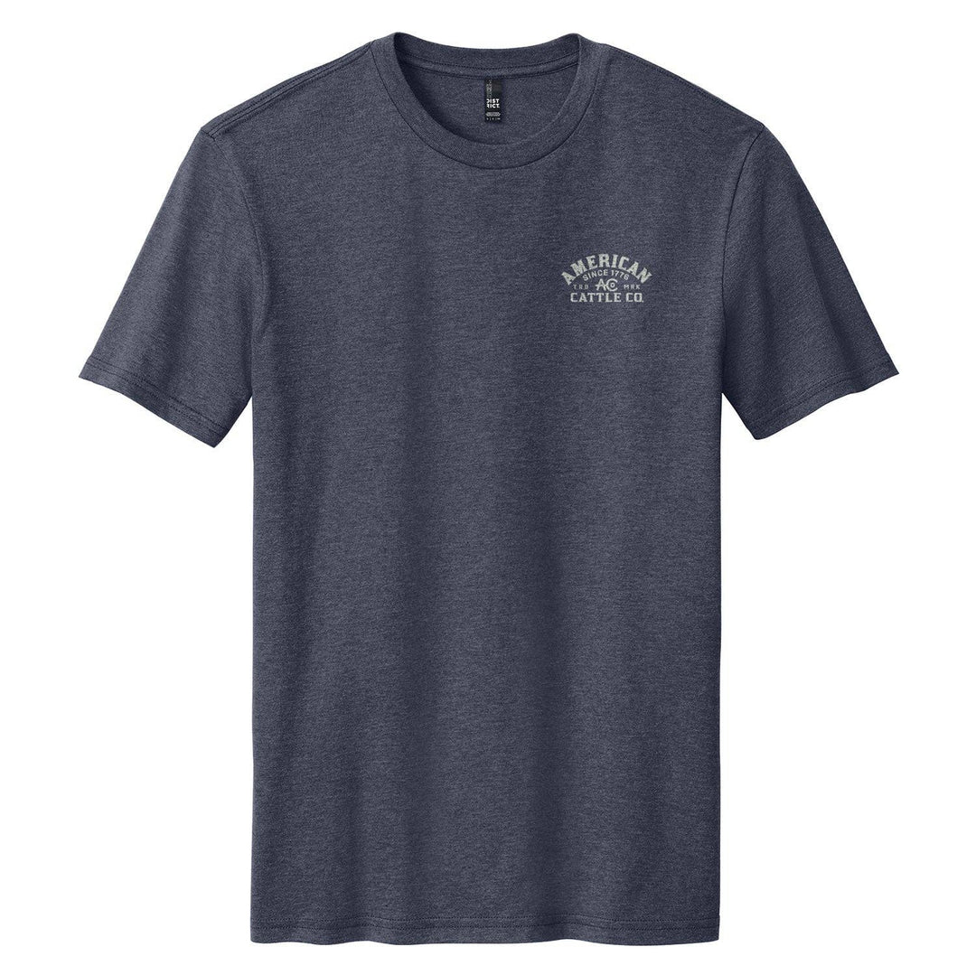 The Bucking Horse Tee from American Cattle Co. rides hard on heritage. Featuring a bold retro rodeo graphic framed in vintage lettering, it’s a nod to the grit of the arena and the cowboy spirit that built this country. This tee holds up through eight seconds or all-day wear. Available in our Smyrna TN shop not far from the Franklin Rodeo.