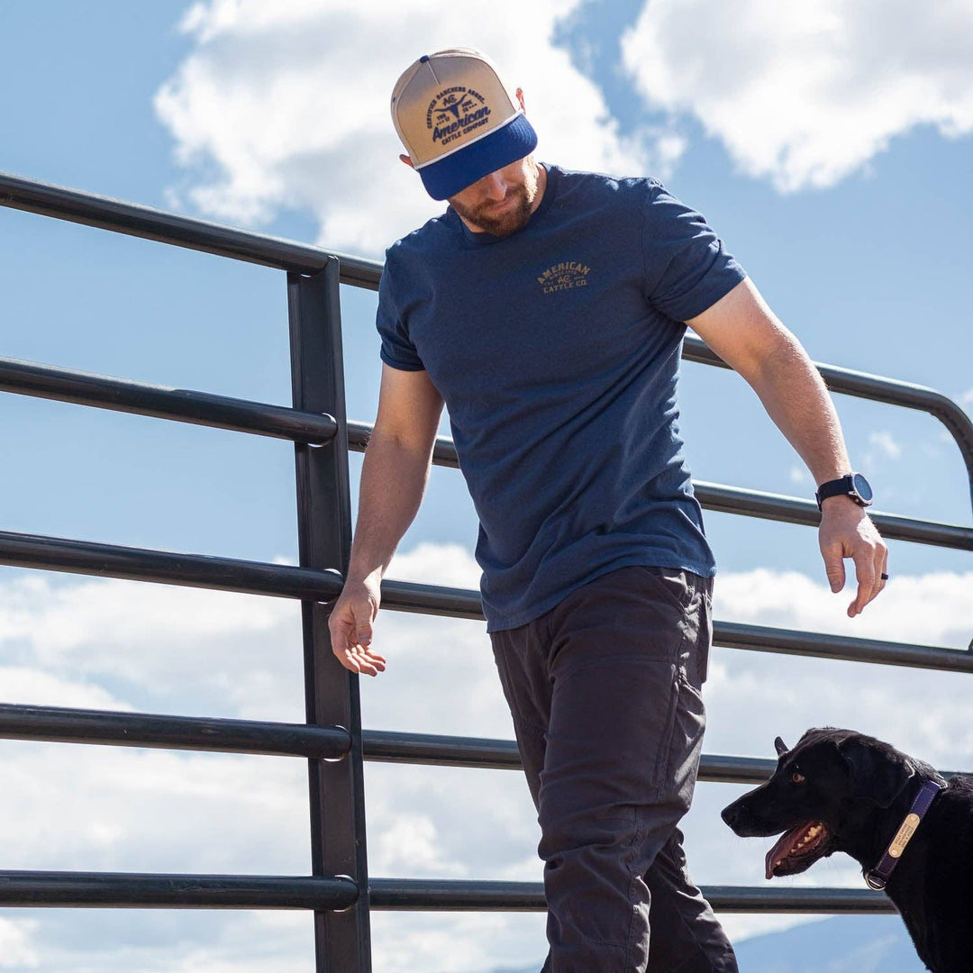 The Bucking Horse Tee from American Cattle Co. rides hard on heritage. Featuring a bold retro rodeo graphic framed in vintage lettering, it’s a nod to the grit of the arena and the cowboy spirit that built this country. This tee holds up through eight seconds or all-day wear. Available in our Smyrna TN shop not far from the Franklin Rodeo.
