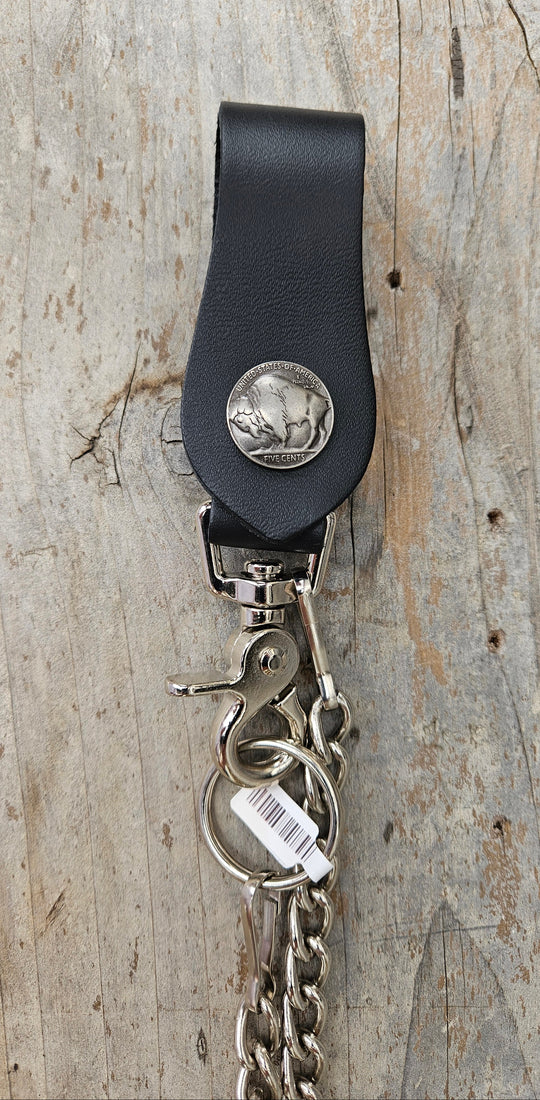 This Vintage style Steel Chain with a classic Buffalo Nickel Concho. Simple but Sturdy and will keep your wallet where it needs to be. The Leather loop, decorated with a Buffalo Nickel, attaches to your jeans and the split ring attaches to your wallet. Chrome plated. Ride down and get yours in our shop just outside Nashville in Smyrna, TN.

18" Chain Length
Leather belt tab