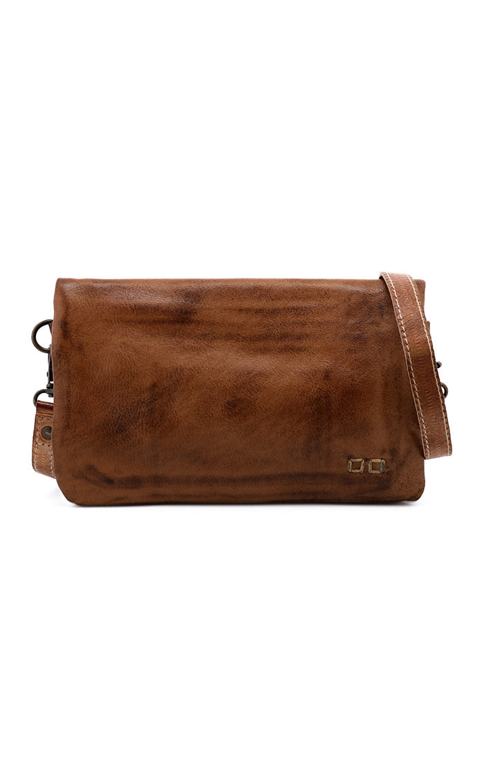 Cadence is a versatile 3-in-1 essential crafted from full-grain, Artisan vegetable-tanned leather. Effortless transitions from wallet to clutch to crossbody with a wrist strap and adjustable body strap, both are detachable. Exterior zip pocket. Sleek magnetic closure with minimalist profile. Interior has two zippered compartments, ID window, and 6 card slots. Measures 8" L x 5" H x 1.5" D. Handmade and hand-finished in León, Mexico. Made by Bed/Stu and now stocked at our Smyrna, TN store.