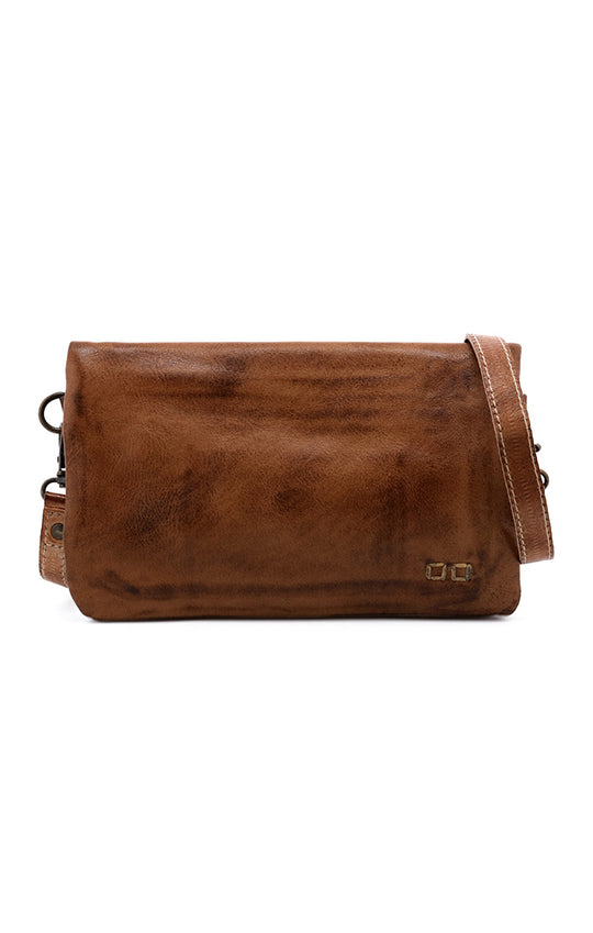Cadence is a versatile 3-in-1 essential crafted from full-grain, Artisan vegetable-tanned leather. Effortless transitions from wallet to clutch to crossbody with a wrist strap and adjustable body strap, both are detachable. Exterior zip pocket. Sleek magnetic closure with minimalist profile. Interior has two zippered compartments, ID window, and 6 card slots. Measures 8" L x 5" H x 1.5" D. Handmade and hand-finished in León, Mexico. Made by Bed/Stu and now stocked at our Smyrna, TN store.