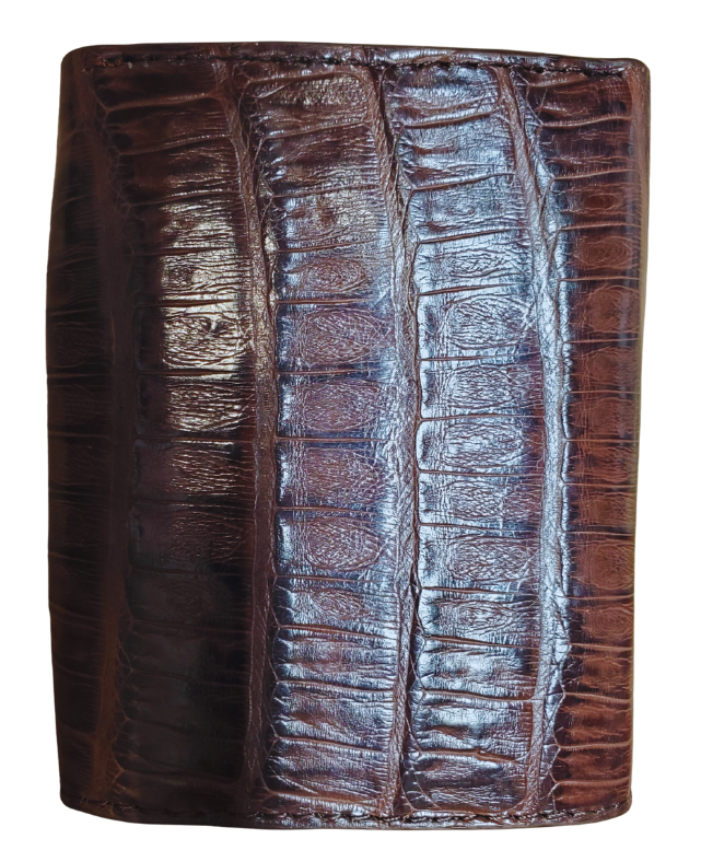 Made from authentic Black or Cigar colored Caiman leather, this bi-fold wallet blends classic western flair with bold luxury. The Stetson name guarantees top-notch craftsmanship and meticulous detail. It offers 6 card slots, 3 hidden pockets underneath, and a spacious cash compartment. Available now at our Smyrna, TN store, just a quick 30-minute drive from downtown Nashville. Proudly made in Mexico.