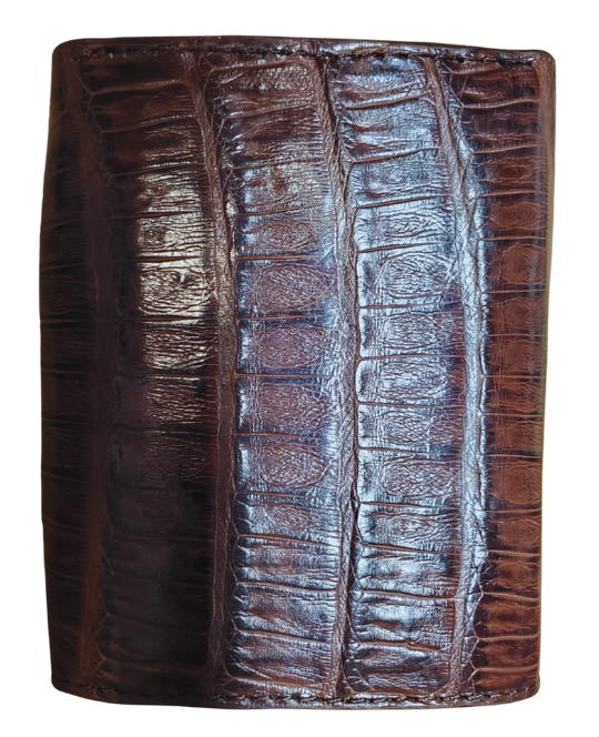 Made from authentic Black or Cigar colored Caiman leather, this bi-fold wallet blends classic western flair with bold luxury. The Stetson name guarantees top-notch craftsmanship and meticulous detail. It offers 6 card slots, 3 hidden pockets underneath, and a spacious cash compartment. Available now at our Smyrna, TN store, just a quick 30-minute drive from downtown Nashville. Proudly made in Mexico.
