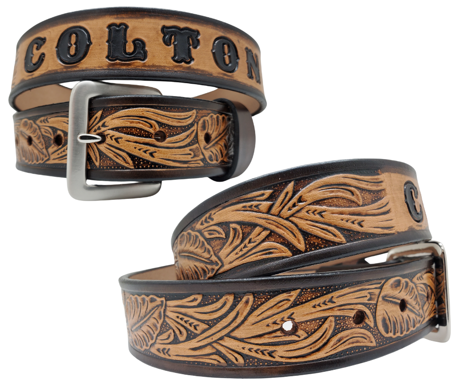 Get ready for the Rodeo adventure of The "Calgary" Name Belt! This one-of-a-kind belt features a 1 1/2" width and is hand-stained with a strip of vegetable tanned leather. The design includes a Classic Tooled Vine center pattern, while the solid brass buckle in antique nickel finish adds a touch of ruggedness. Handcrafted at our shop in Smyrna, Tennessee, just outside Nashville.