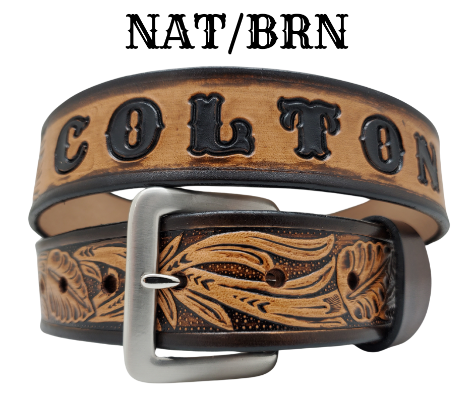 Get ready for the Rodeo adventure of The "Calgary" Name Belt! This one-of-a-kind belt features a 1 1/2" width and is hand-stained with a strip of vegetable tanned leather. The design includes a Classic Tooled Vine center pattern, while the solid brass buckle in antique nickel finish adds a touch of ruggedness. Handcrafted at our shop in Smyrna, Tennessee, just outside Nashville.