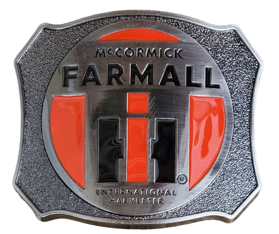 Farmall International Harvester Belt Buckle, Shield shaped with classic logo in Red, Black on antique Silver background. Size approx. 3 3/4" wide x 2 3/4" height, Fits up to 1 1/2" wide belts. Available in our shop in Smyrna, TN just outside Nashville as well as from this online store.