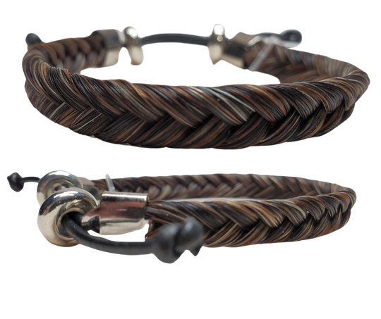 Discover the timeless charm of Braided Horsehair in our classic Western style bracelet. Features strong adjustable slider for durability. To ensure a comfortable fit, wear it snug or even take it in the water - just be sure to remove it before swimming or showering. You can find these at our shop in Smyrna, TN, conveniently located just a short drive away on I-24 from Nashville.