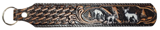 Long Leather embossed Key Fobs that are made in our Smyrna, TN shop. Longer length makes them easier to find in your bag or pocket. Choose popular Designs.

Size is 8"L x 1 1/4" Designs may vary from picture slightly
