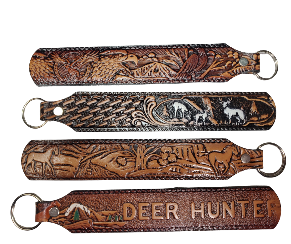 Long Leather embossed Key Fobs that are made in our Smyrna, TN shop. Longer length makes them easier to find in your bag or pocket. Choose popular Designs.

Size is 8"L x 1 1/4" Designs may vary from picture slightly