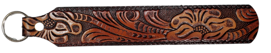 Long Leather embossed Key Fobs that are made in our Smyrna, TN shop. Longer length makes them easier to find in your bag or pocket. Choose popular Designs.

Size is 8"L x 1 1/4" Designs may vary from picture slightly