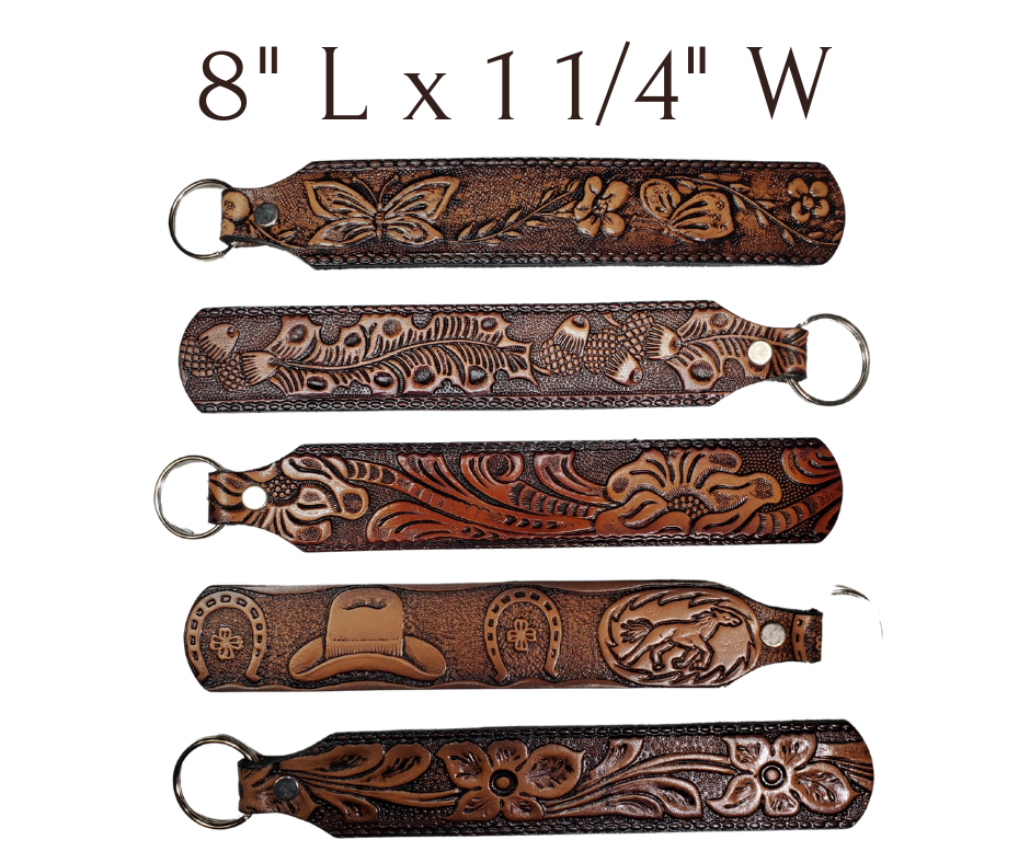 Long Leather embossed Key Fobs that are made in our Smyrna, TN shop. Longer length makes them easier to find in your bag or pocket. Choose popular Designs.
 
Size is 8"L x 1 1/4" Designs may vary from picture slightly