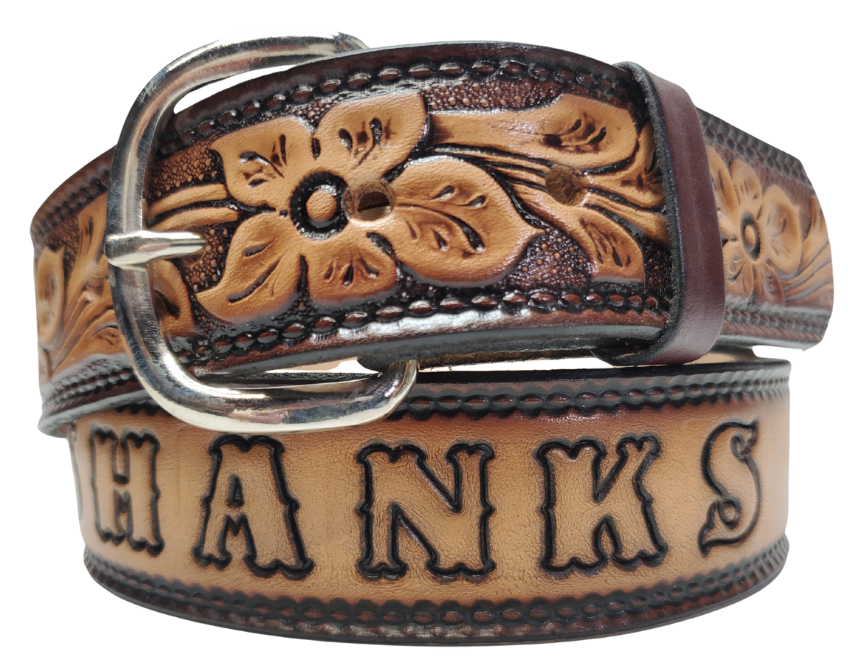 The Dogwood leather belt is the Iconic Flower Pattern with Brown fade into a Natural Leather finish. Available in a 1 1/2" width. Full grain vegetable tanned cowhide, Width 1 1/2" and includes Nickle plated  buckle Smooth burnished painted edges. Made in USA! For name Type name or No Name in "Type Name Here" section. Buckle snaps in place for easy changing if desired. In stock at our Smyrna, TN shop.
