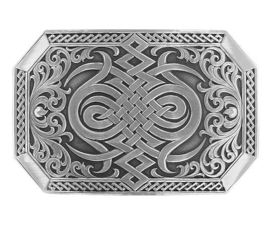 A Western inspired Celtic knot decorates the center of the buckle in a silver finish design, bookended by silver finished sideways heart's flame design with filigree scrollwork coming out from the sides. Repeating diamond pattern trim on the sides and finished 'corner' bars. The silver designs are with a deeper antiqued background. Standard 1.5in belt swivel approx. 2 1/2" x 3 3/4". Available at our Smyrna, TN just a short drive from downtown Nashville. Made by Montana Silversmith.