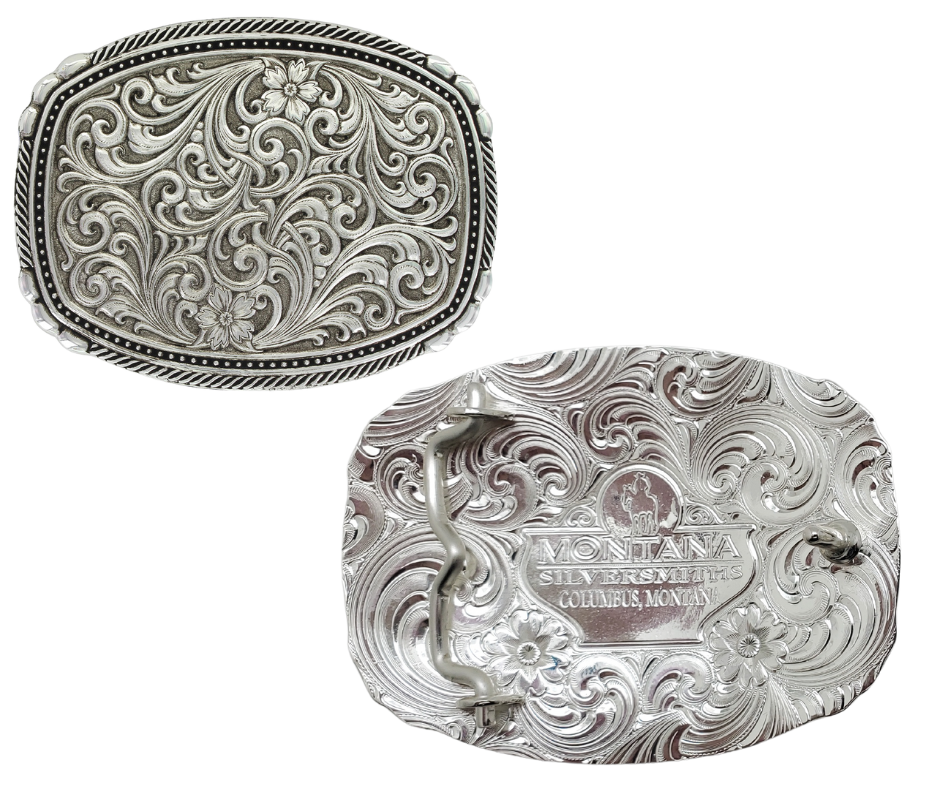 <span data-mce-fragment="1">&nbsp;</span>This buckle features a beautiful Intricate Western Scroll pattern as the main design. Its antiqued curved rectangular shape is accented with twisted silver finished rope edging and high-domed beads, framing the bright cut Western scroll design. It can fit a standard 1.5 inch belt and measures approximately 3 3/4"" across x 3" tall. You can find it at our Smyrna, TN location, just a short drive from downtown Nashville. Made by Montana Silversmith.