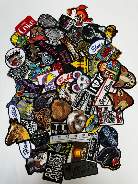 Iron on or sew on patches in packs of 10 or 20 pieces. We will pick the best assortment of a wide range of types from animals, biker, humor. These are all "clean" themes and words with a average size of 2" to 3" in size. Stocked in our Smyrna, TN shop.