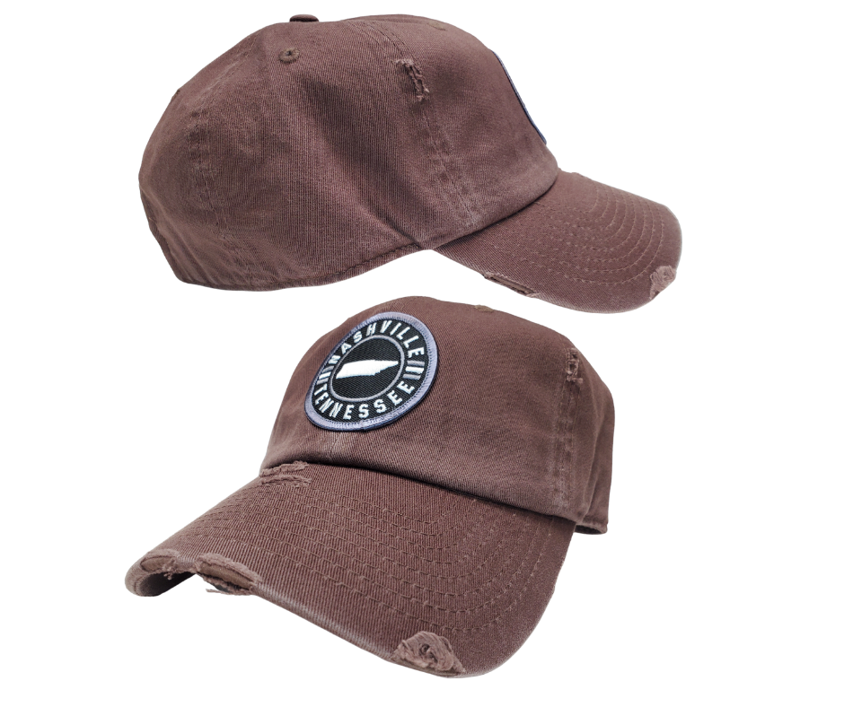 Embroidered Nashville Tennessee Patch Vintage distressed washed style 100% breathable premium cotton Pre-curved visor with 8-row stitching on visor. Matching under visor 6 panel low profile unconstructed Lightweight, durable, smooth, with a hint of stretch One size fits most, Adjustable metal buckle back closure. Shop now at our Smyrna, TN store or online.