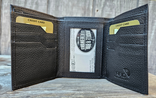 The Cooper Tri-fold leather wallet will be your daily carry. Equipped with 8 credit card slots and 1 ID window slot in the center. The main compartments has a cash divider. Lined with RFID blocking. Available in our Smyrna, TN shop near Sewarts Landing.

Made in India.
Approx. Size: 3 1/4"x 4 1/4" when closed.