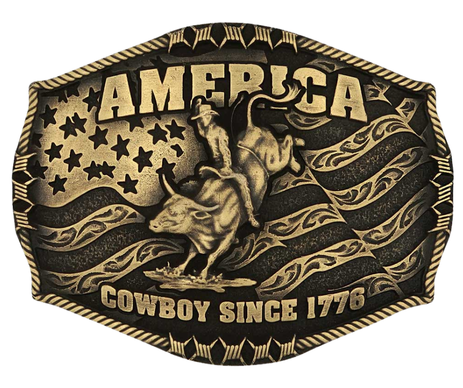 Stand for liberty and Western heritage for all with the Cowboy Since 1776 Attitude Buckle. The waving American flag provides the backdrop for the design. The word "America" sits above the bull rider figure. The words "Cowboy Since 1776" is beneath the bull rider figure. A roped border with barbed wire design creates the edge of the buckle, giving the piece a rustic look. Fits 1.5 inch belts. Find it online or at our shop just outside Nashville in Smyrna, TN.