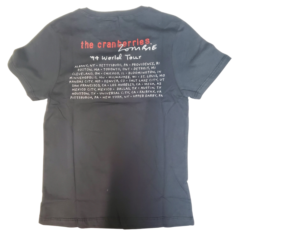 The Cranberries Zombie Tee will remind you of those Zombie with vintage style graphics and tour dates on the back. Super soft feel. A few left in stock at our Smyrna, TN shop.

Sizing measurements:
Chest under arm pit S-16", M-17", LRG 18", XL-19", 2X- 20"
Length top of neck to bottom of shirt S -24, M-25", L-26", XL-27", 2X-28"