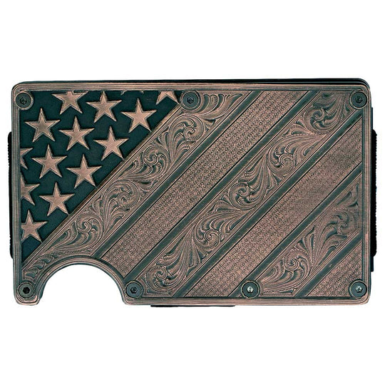Available at our shop just outside Nashville in Smyrna, TN. Our All American Bronze Credit Card Holder is a beaut! It offers a distinctive, slim design that is practical and comfortable in your hand and pocket, making it an everyday essential. One side with a bronze finished panel of Montana Silversmiths signature bright-cut engraving. The Carbon Fiber side has a clip that can hold your cash. Holder expands to hold a multitude of cards with thick elastic bands.